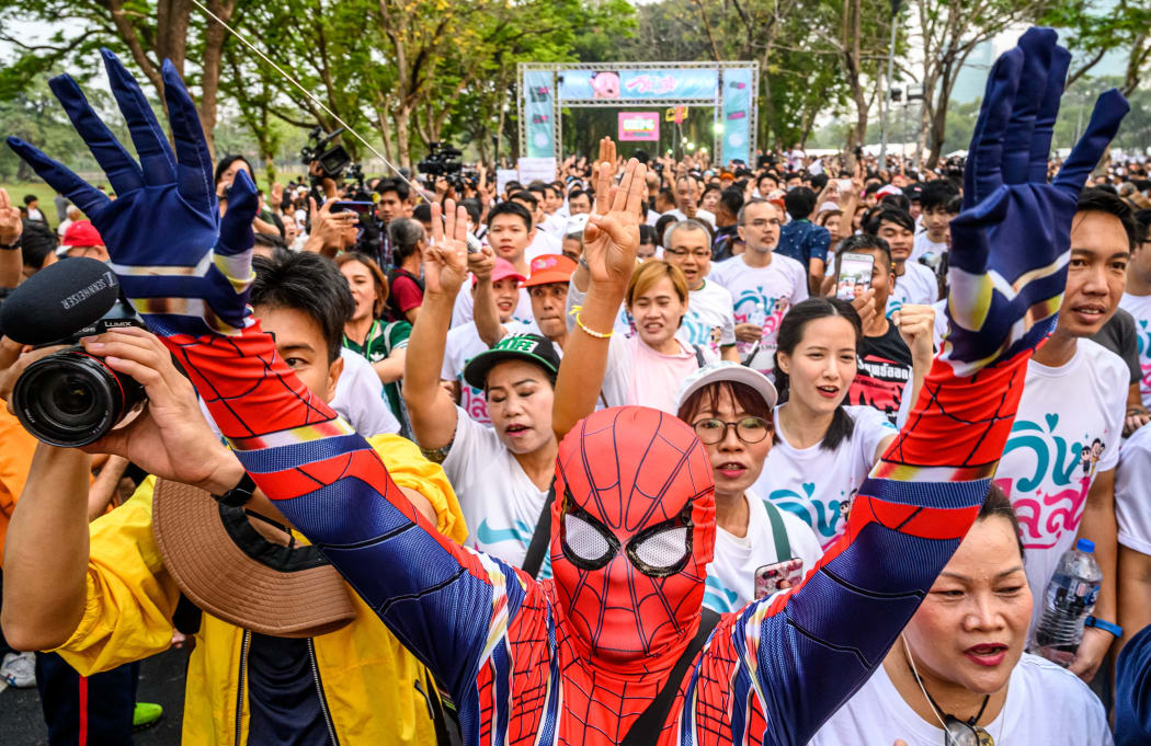 A man dressed as Spider-Man takes part in a "run against dictatorship" in Bangkok on January 12, 2020.
