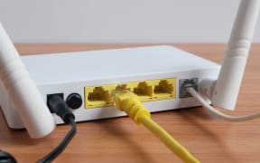 Modem router wifi wireless connect lan cable On wooden floor