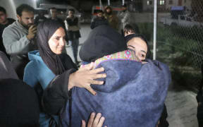 Palestinians coming from the Rafah crossing from Egypt arrive at Nasser Hospital in Khan Yunis in the southern Gaza Strip on February 2, 2026. Sick and wounded Gazans began crossing into Egypt to seek medical treatment after Israel permitted a limited reopening of the Palestinian territory's Rafah border post. Around 150 people were due to leave the territory, and 50 to enter it, according to Egyptian officials, more than 20 months after Israeli forces fighting in Gaza closed the crossing.