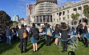 About 60 Wellington Girls' College students set up a makeshift classroom on Parliament grounds as a protest against the school having to close for two days over quake-prone buildings 14 August 2024