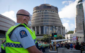 Protestors and Police standoff as police move concrete barricades