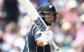 Ross Taylor salutes after scoring 50.