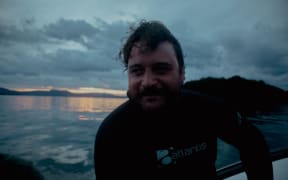 Troy on a boat in Rakiura