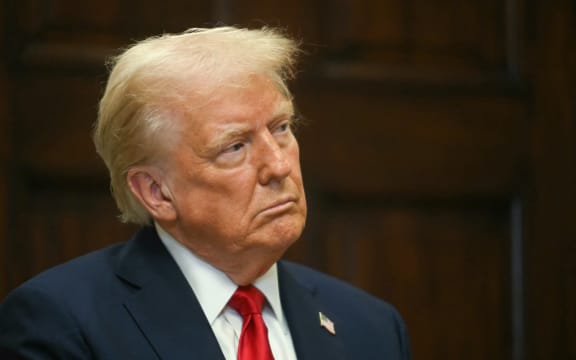 US President Donald Trump speaks in the Roosevelt Room at the White House on 21 January, 2025, in Washington, DC.