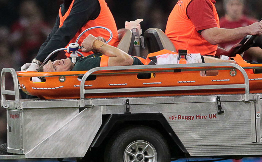 Springbok captain Jean de Villiers carted from field after suffering knee injury playing against Wales 2014.