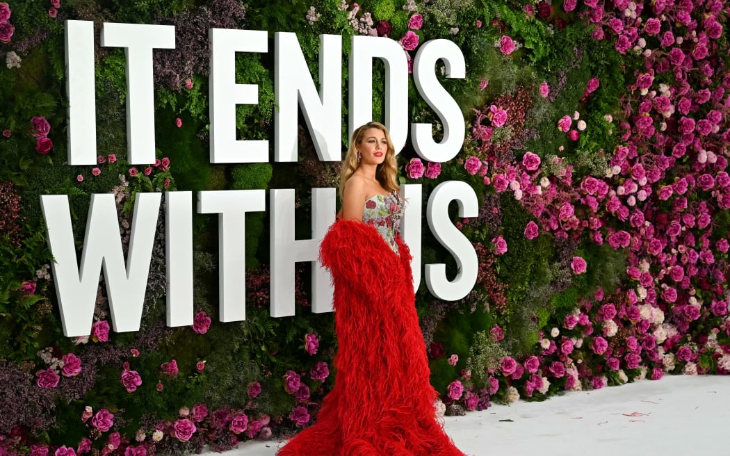 US actor Blake Lively poses on the red carpet upon arrival to attend the UK gala screening for "It ends with us" at the Odeon Luxe in Leicester square, central London on August 8, 2024.