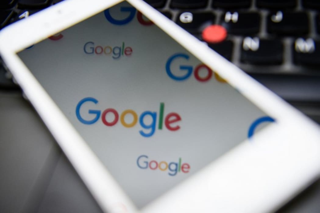 The logo for US technology company and search engine Google is displayed on screens in London on February 11, 2016.