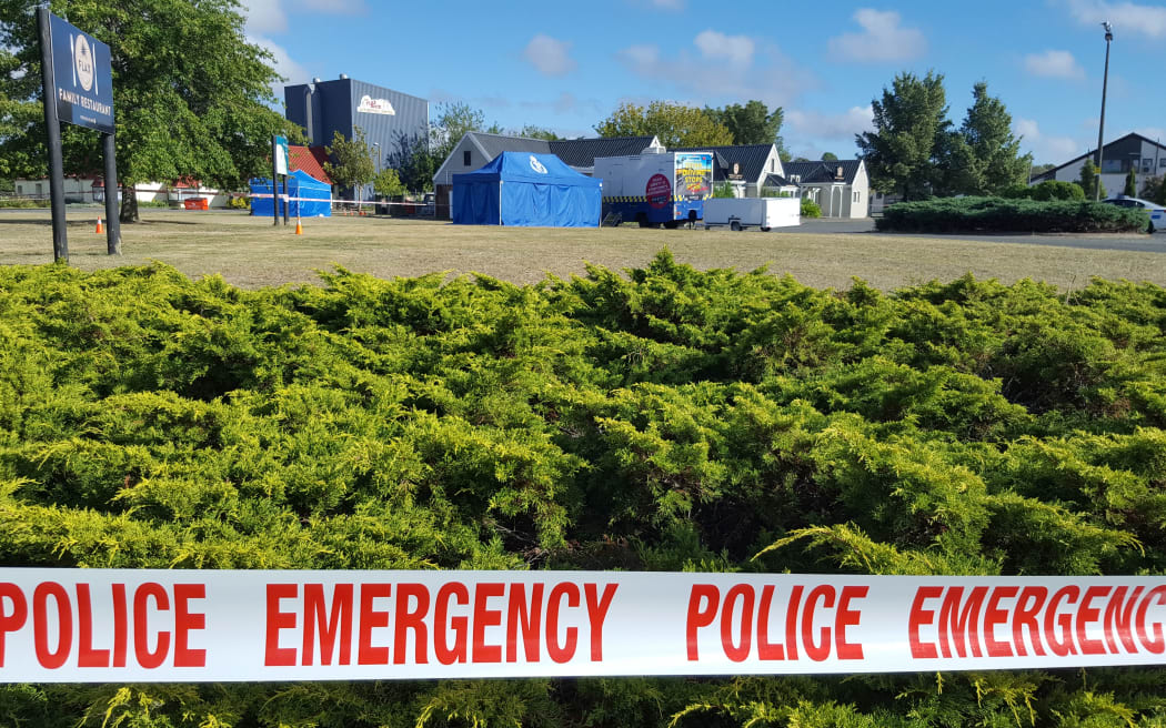 Police tape outside the Flax Bar and Eatery, where a homicide investigation has been launched.