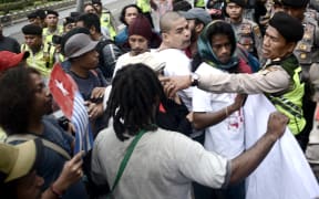A low-level insurgency has simmered for decades in resource-rich Papua, with Jakarta keeping a tight grip on the region through a heavy military and police presence.