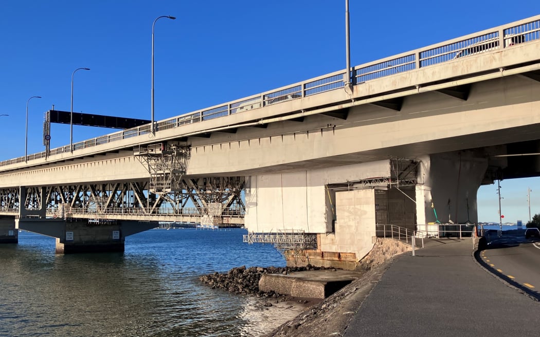 Engineers are trialling containment systems on the land-based areas of the bridge - the structures that will allow workers to eventually access and repaint the bridge.