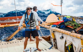 The Hōkūleʻa crew negotiate big seas.