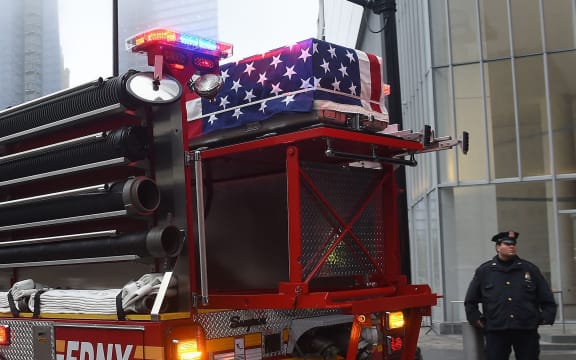 One of the caskets carrying the remains of those killed the September 11, attacks sits is returned to Ground Zero in New York.