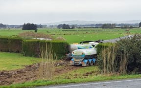 The truck crashed into a house after colliding with a car on State Highway 1 at Edendale