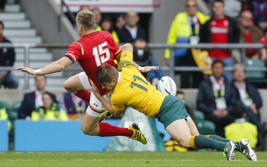 Gareth Anscombe of Wales is tackled by Drew Mitchell of Australia 10.10.2015. Twickenham Stadium, London, England. Rugby World Cup. Australia v Wales
