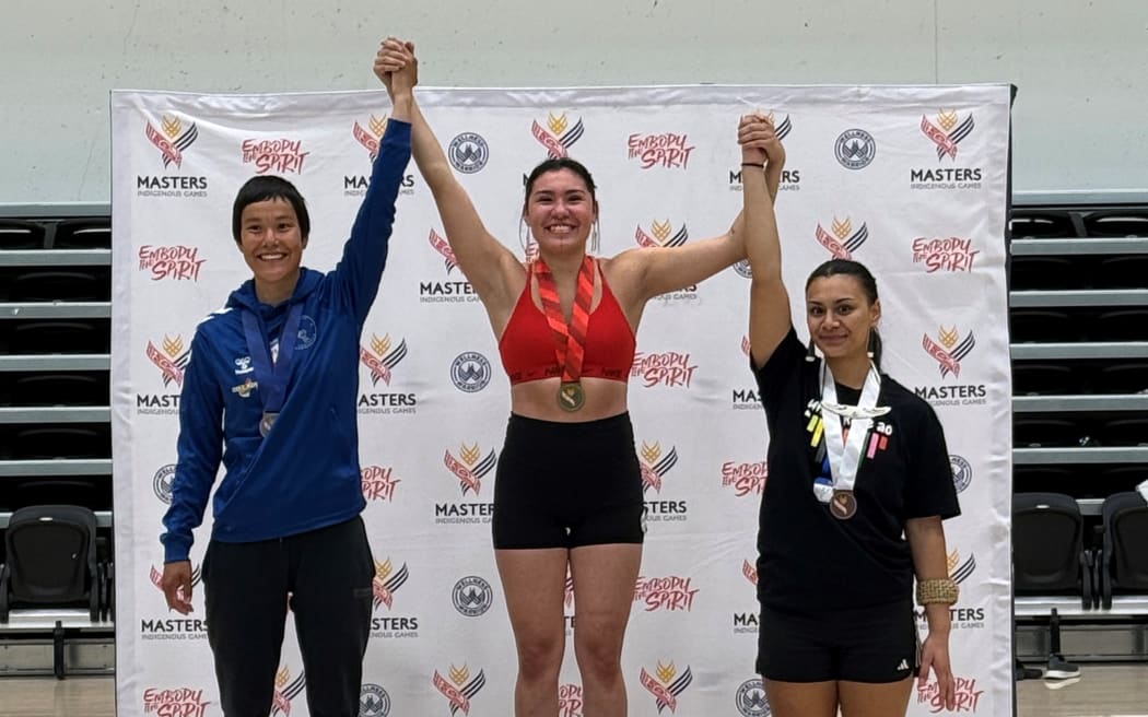 Yves Brown, right, won bronze in the women’s seal hop.