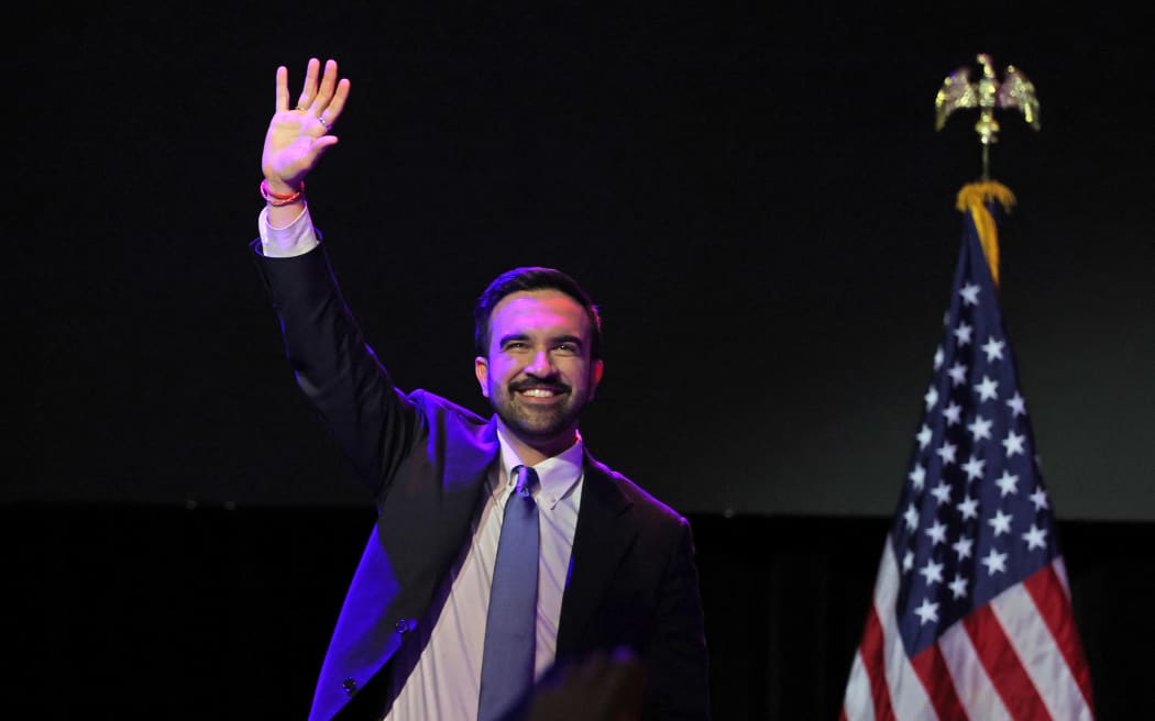 New York City Mayoral candidate Zohran Mamdani celebrates during an election night event at the Brooklyn Paramount Theater in Brooklyn, New York on November 4, 2025. New Yorkers elected leftist Zohran Mamdani as their next mayor November 4, 2025 broadcasters projected, on a day of key local ballots across the country offering the first electoral judgement of Donald Trump's tumultuous second White House term. (Photo by ANGELA WEISS / AFP)