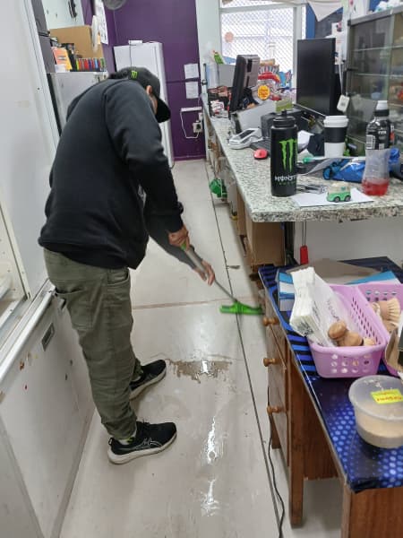 Clean-up at the flooded Konini Superette in Wainuiomata.