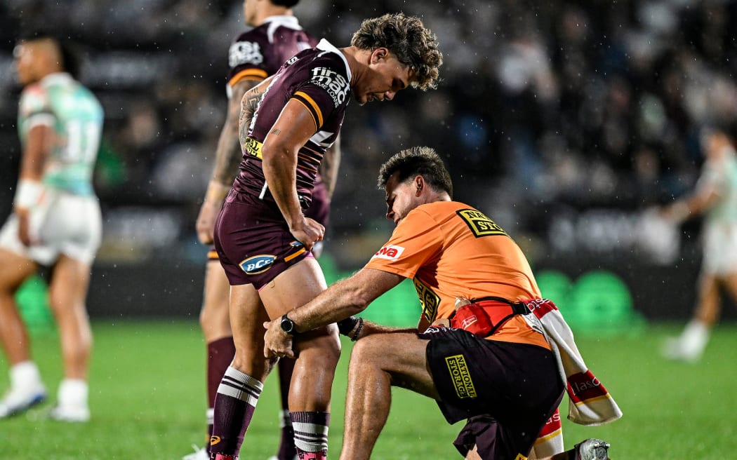 Reece Walsh of the Broncos receives some medical attention, New Zealand Warriors v Brisbane Broncos.