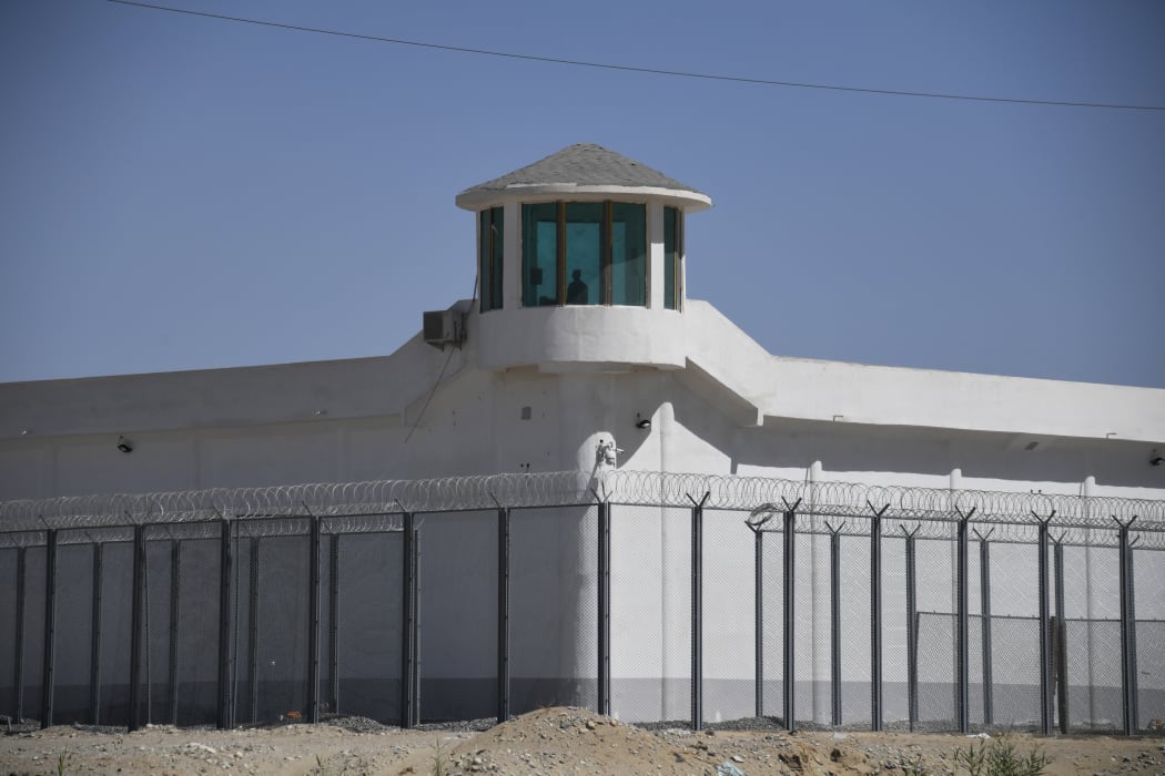 This photo taken on May 31, 2019 shows a watchtower on a high-security facility near what is believed to be a re-education camp where mostly Muslim ethnic minorities are detained, on the outskirts of Hotan, in China's northwestern Xinjiang region.