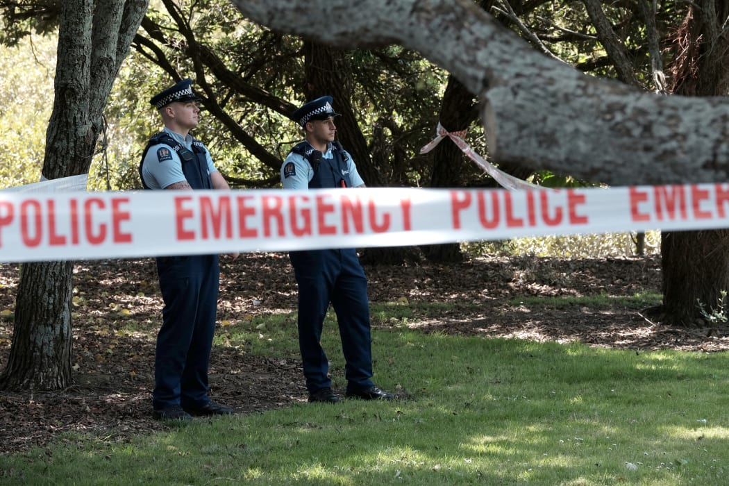 Police guard the scene at Mona Ave in Mangere Bridge where the baby's body was found.