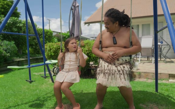 Grizz and Uncle JP on the swingset