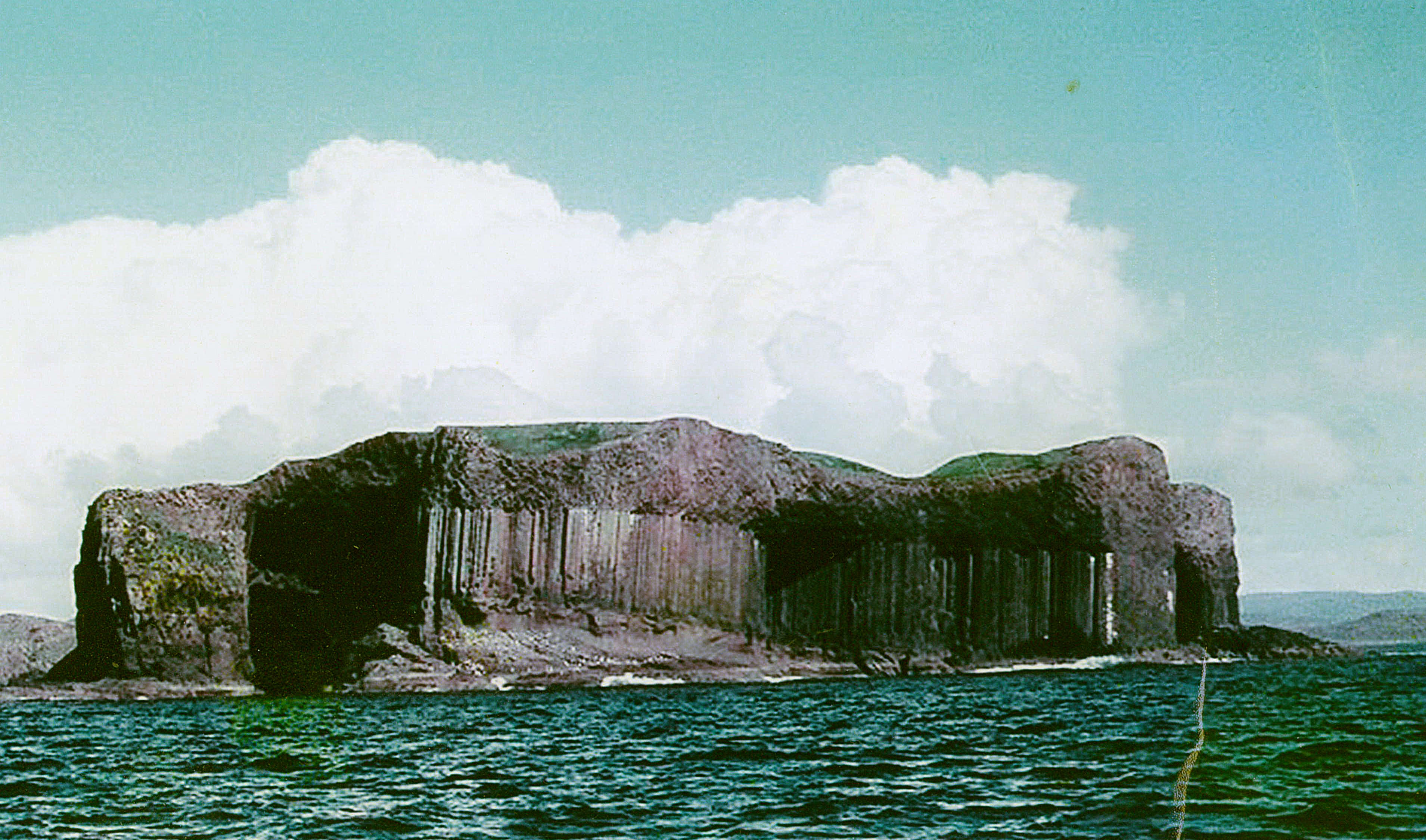 The Isle of Staffa, with its Fingal's Cave to the right - inspiration for Mendelssohn's Hebrides Overture.