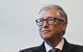Microsoft founder Bill Gates reacts during a visit with Britain's Prime Minister Rishi Sunak of the Imperial College University, in central London, on February 15, 2023. (Photo by JUSTIN TALLIS / POOL / AFP)