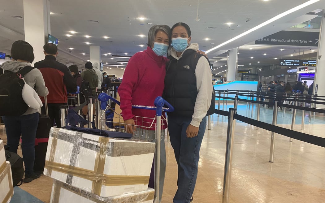 Vaiolama Feau and her mum getting ready for their quarantine free flight to Niue