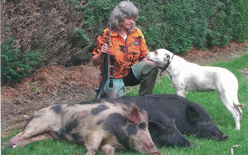 Pig hunter Kim Swan with her loyal canine Pearl.