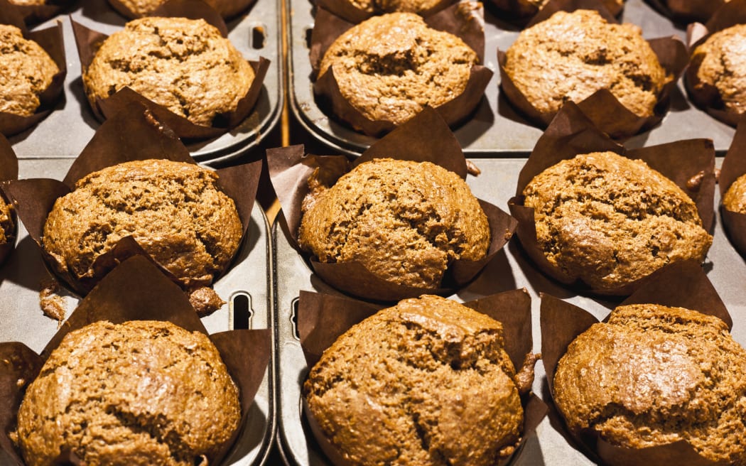 Muffins in baking tin (Photo by Hybrid Images / Cultura Creative / Cultura Creative via AFP)