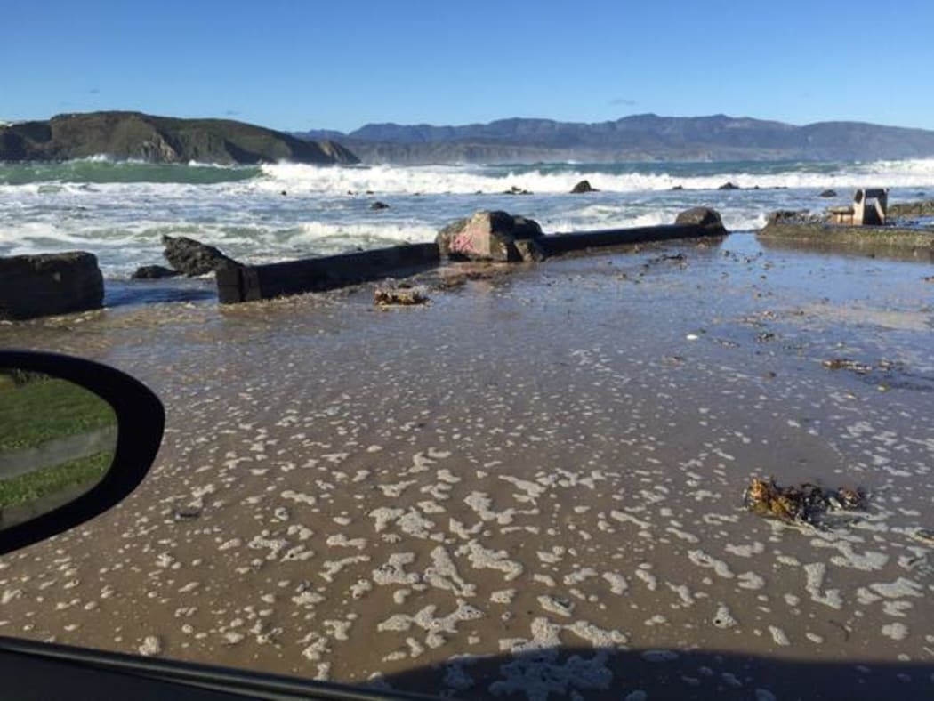 A Lyall Bay carpark awash with sea water.