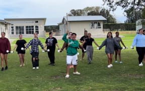 Tamariki preparing for He Toi Kupu - Uhi Tai