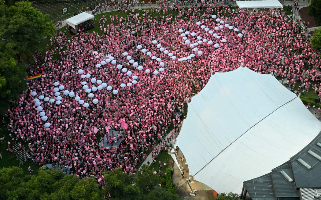 Supporters attend the annual Pink Dot event in a public show of support for the LGBT community at Hong Lim Park in Singapore on 18 June 2022.