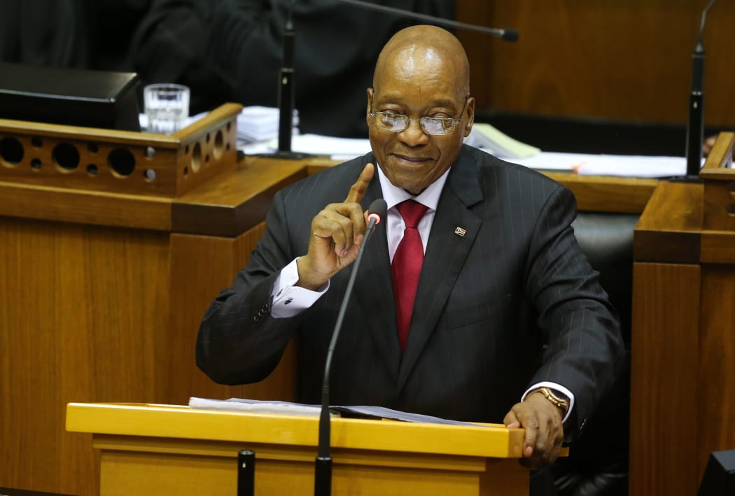 South African President Jacob Zuma gestures as he delivers the speech for 2017's State Of the Nation Address