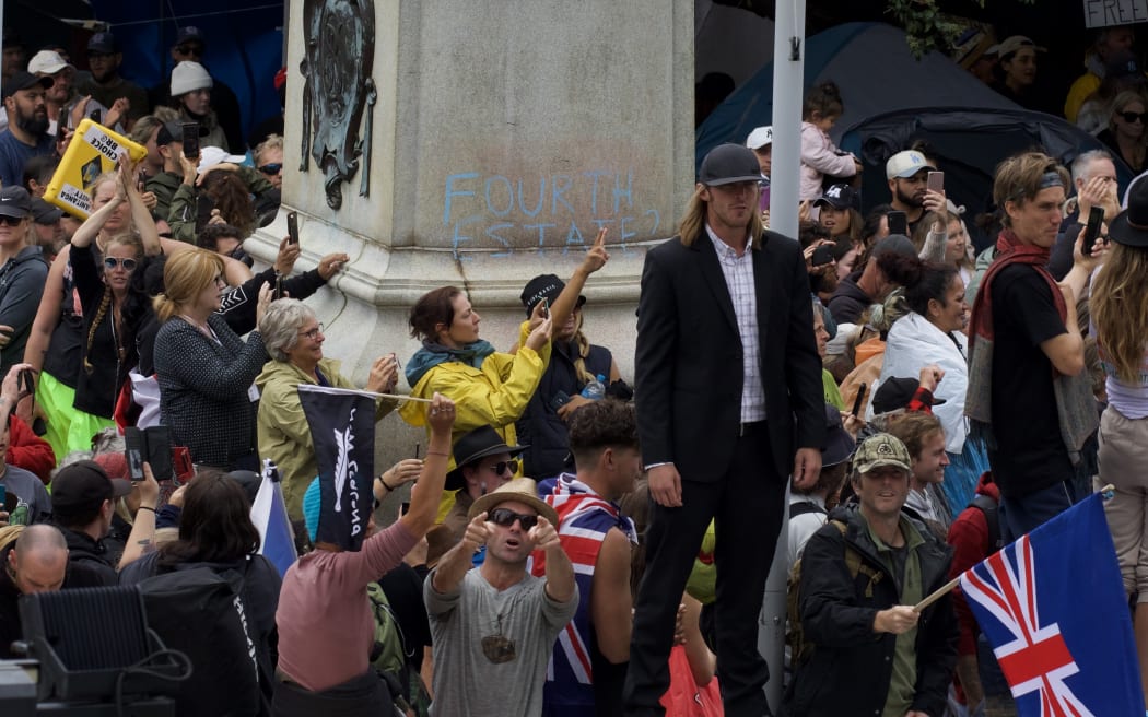 Hundreds of people protesting against Covid-19 vaccine mandates among other things, held a 23-day occupation on the grounds of New Zealand's parliament beginning on 8 February 2022, blockading roads in the area and causing schools, universities and businesses to close.