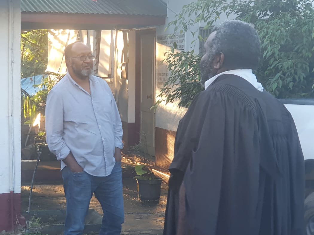 Charlot Salwai with his legal counsel Daniel Yawah.