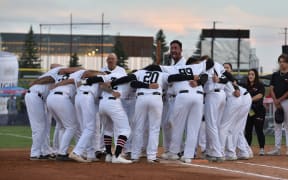 Pita Rona leads a powerful haka for the New Zealand Black Sox, before Game 2 of the WBSC World Cup against Argentina - the Worlds number 1 ranked team.