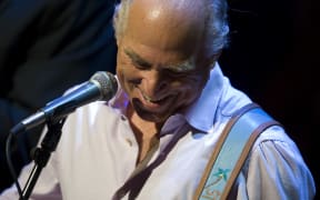 Singer songwriter Jimmy Buffett performs "Son of a Sailor" during a memorial service for CBS newsman Walter Cronkite at the Lincoln Center in New York City, NY, 9 September, 2009. Walter Cronkite died on July 17, 2009 at age 92.