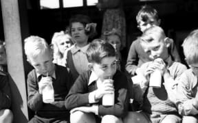 Pupils drinking their school milk in the 1940s in Christchurch