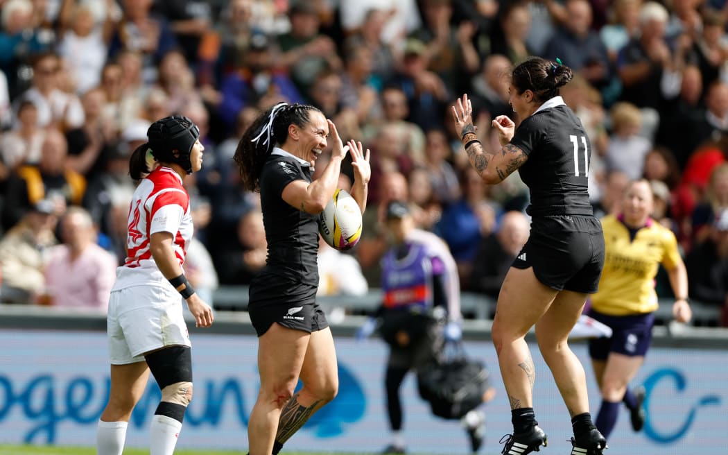 Portia Woodman-Wickliffe celebrates scoring for the Black Ferns against Japan.