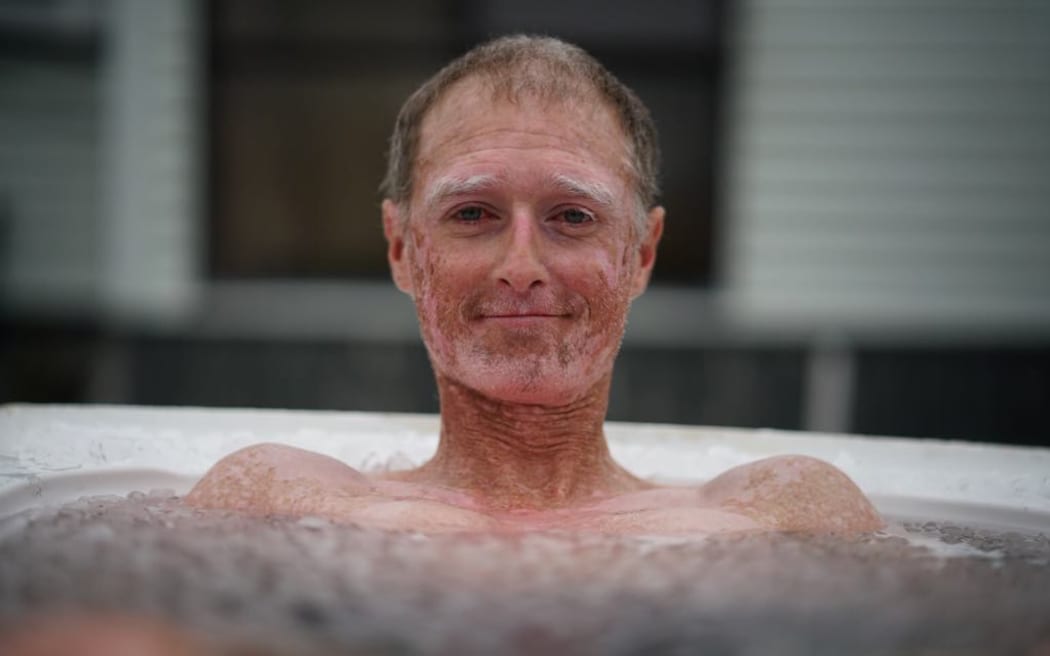 Josh Komen in an ice bath.