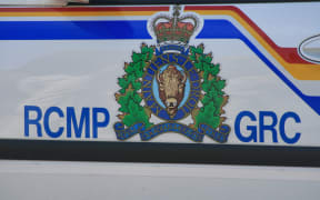 Royal Canadian Mounted Police (RCMP) emblem on the side of a police cruiser in Ottawa, Ontario, Canada.