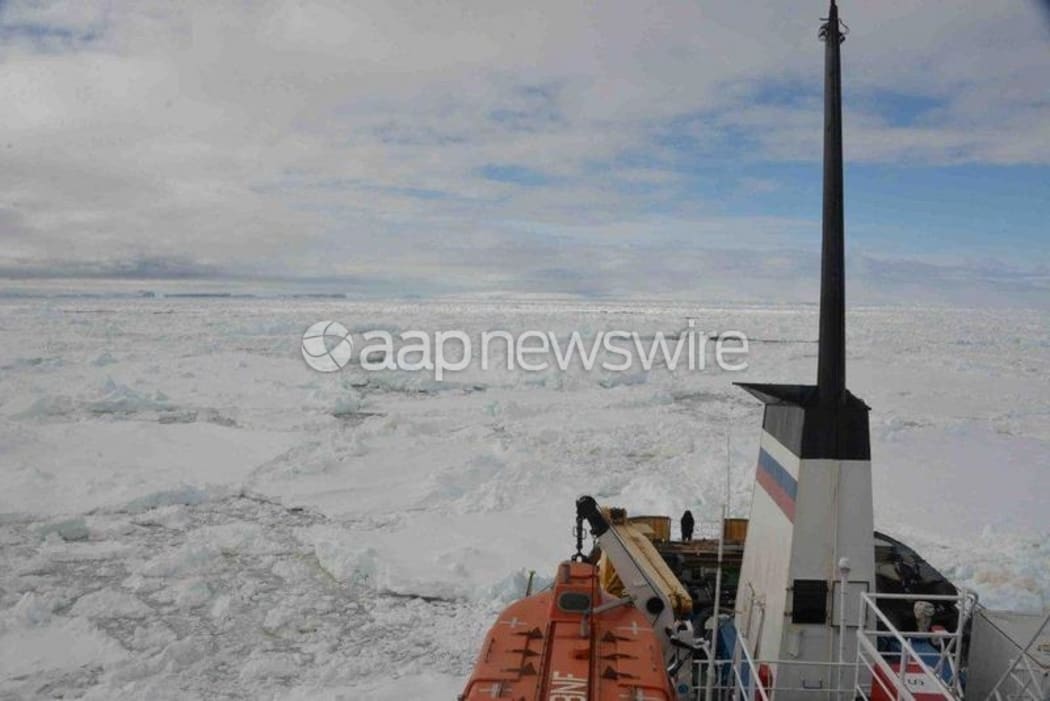 The MV Akademik Shokalskiy wedged in thick sheets of sea ice.
