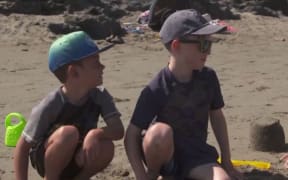 Sam Kerr, left, and his brother, Nathan Kerr at Christuch's Sumner Beach