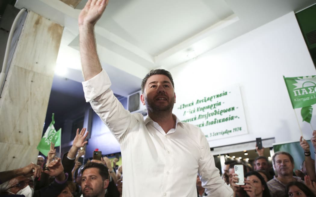 PASOK party leader Nikos Androulakis, celebrates with supporters of the Party, on May 21, 2023 (Photo by Giannis Dimitropoulos / SOOC / SOOC via AFP)