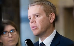 Prime Minister Chris Hipkins talks to journalists.