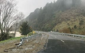 Damage to the Racecourse Bridge on State Highway 14.