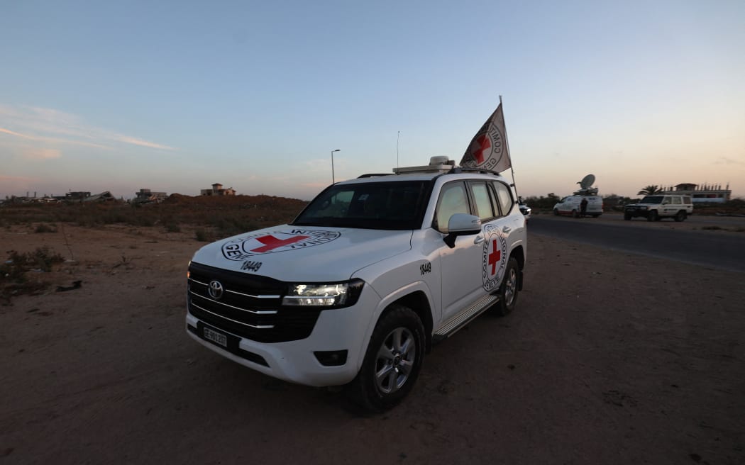 An International Red Cross (ICRC) vehicle drives in Deir el-Balah as it transports US-Israeli hostage Edan Alexander on 12 May, 2025, after being handed over by Al-Qassam Brigades.