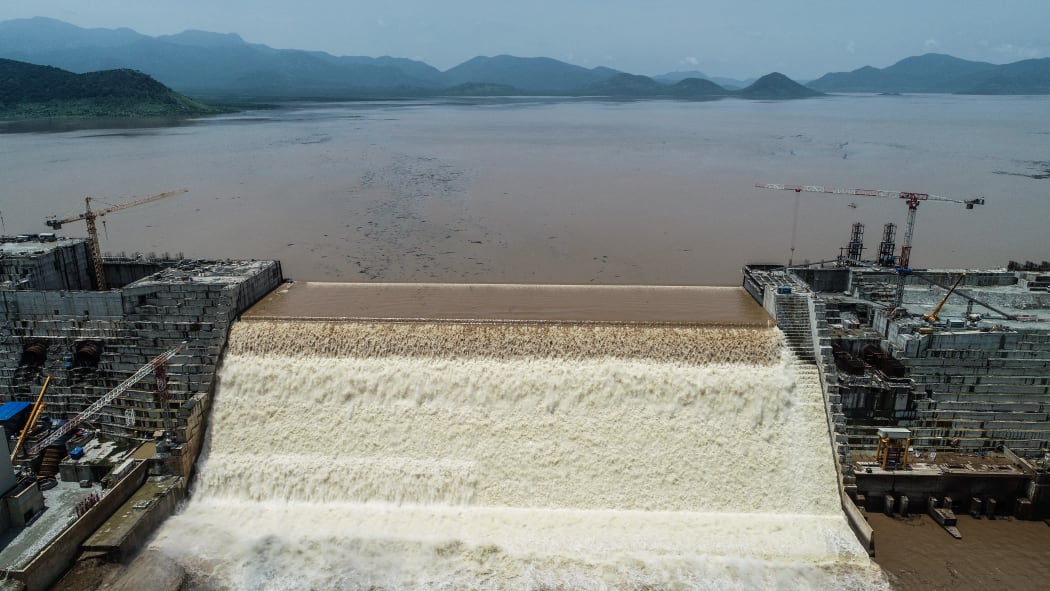 This handout picture taken on July 20, 2020, and released by Adwa Pictures on July 27, 2020, shows an aerial view Grand Ethiopian Renaissance Dam on the Blue Nile River in Guba, northwest Ethiopia.