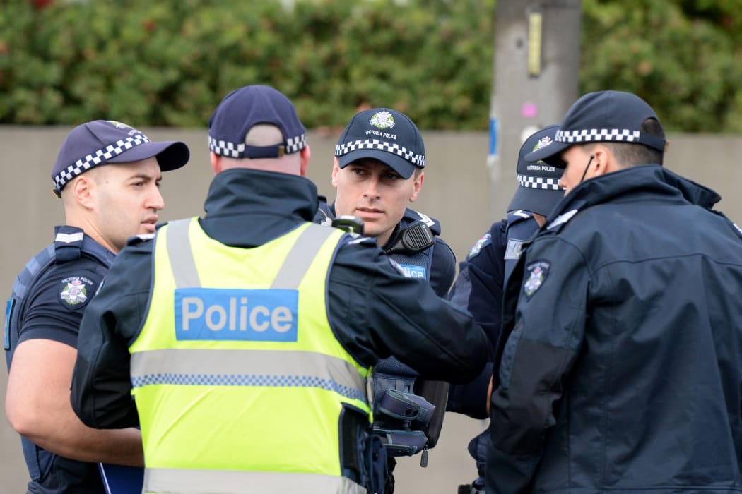 Police at the scene the siege in the suburb of Brighton on 6 June.